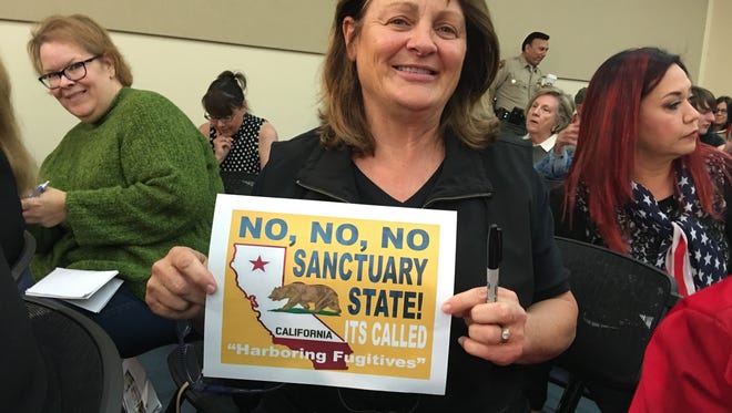 Opponents of California's sanctuary state laws turned out in force at the Thousand Oaks City Council's meeting on May 1, 2018.
