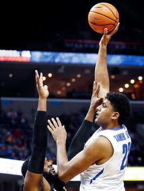 Memphis center Karim Sameh Azab puts ups a shot against