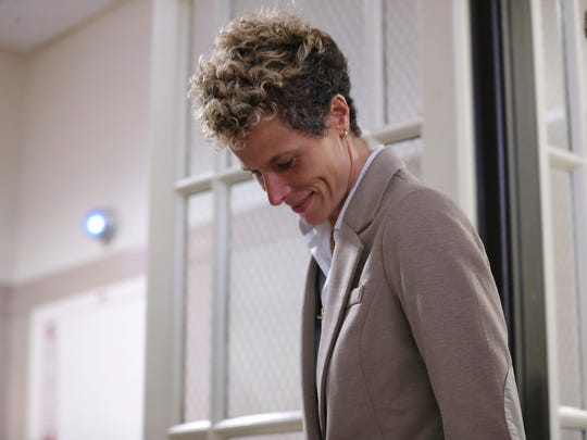 Accuser Andrea Constand leaves after the first day