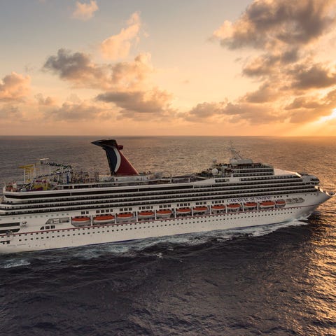 A Carnival cruise ship sailing in the ocean during