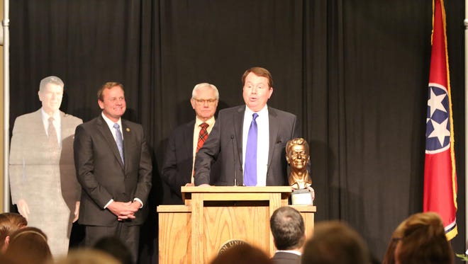 Tommy Hopper receives the Ronald Reagan Award, a lifetime achievement award from the Madison County Republican Party, Monday evening during the party’s 2016 Reagan Day Dinner at Union University’s Carl Grant Center. Presenting the award were Chairman of the Madison County Republican Party Mike Peery and 8th District Congressman Stephen Fincher.