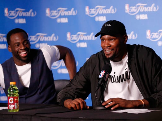 Draymond Green and Kevin Durant at a press conference