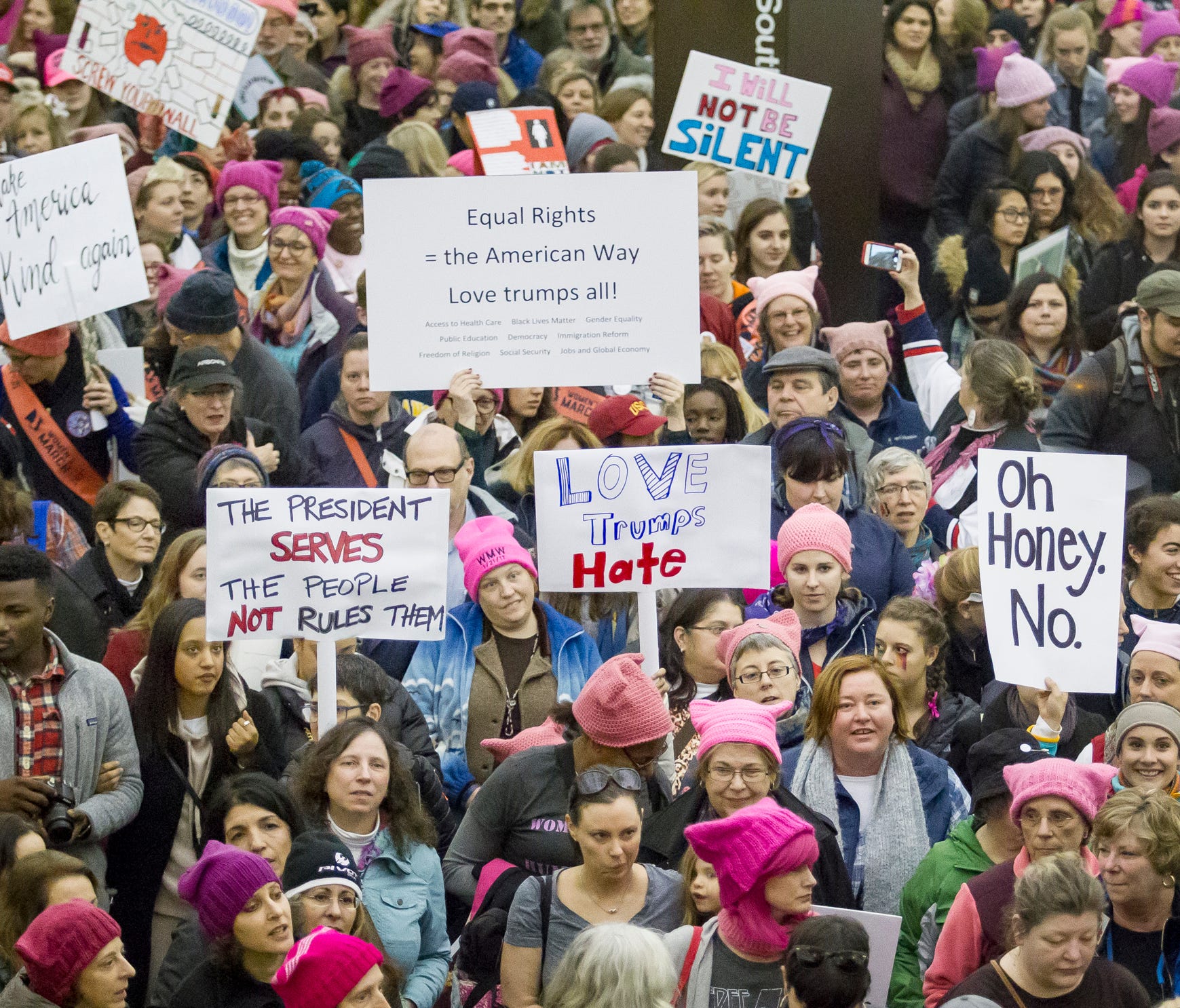 Marchers make their way through the Capital South Metro Station with hundreds of other marchers as they make their way to the Women's March on Washington in January.
