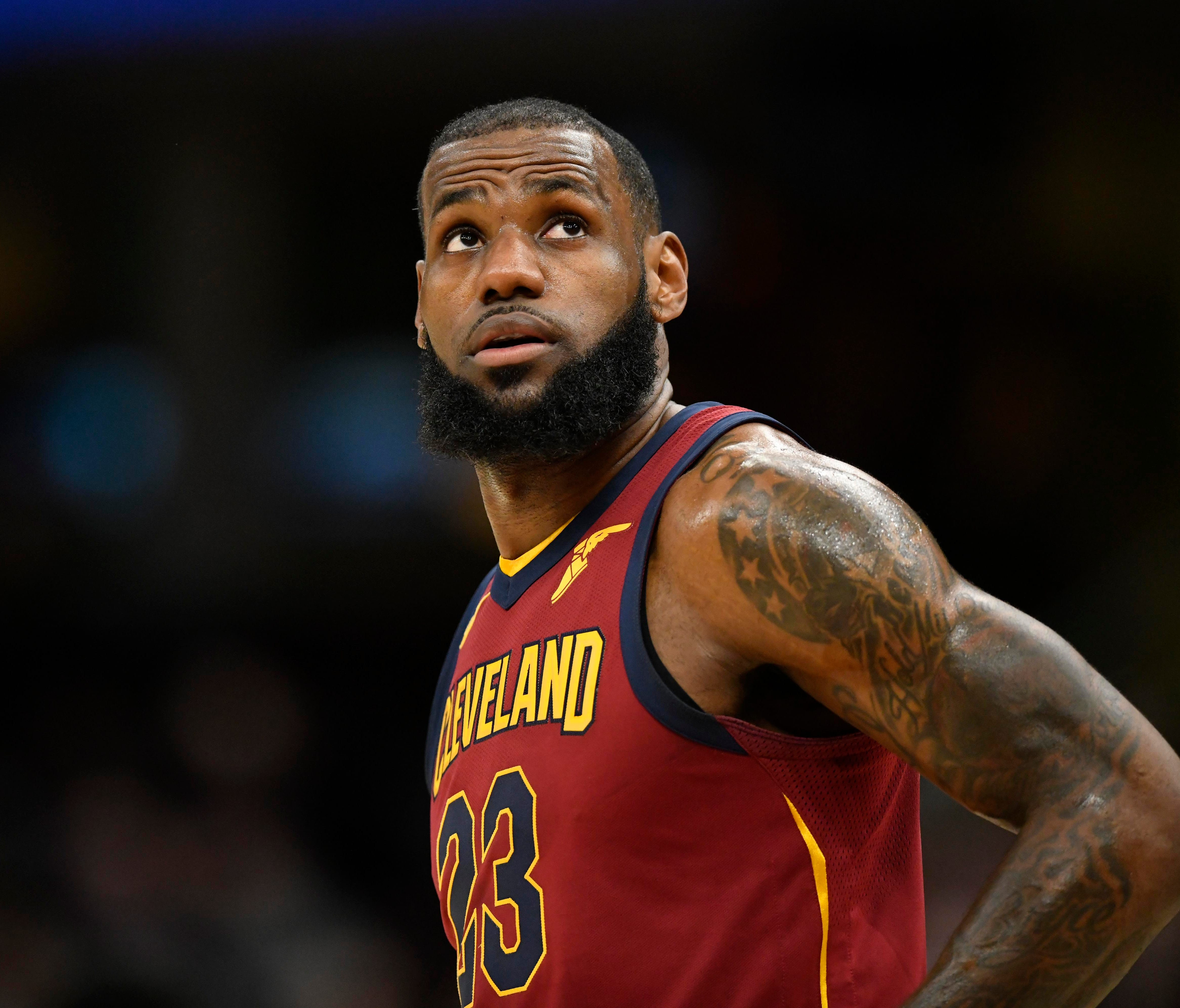 Cleveland Cavaliers forward LeBron James reacts in the first quarter against the Brooklyn Nets.