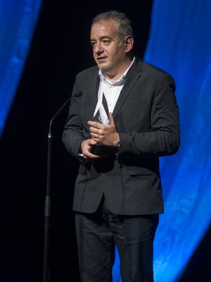Stephan Komandarev, director of "The Judgment," on Oct. 24, 2015, accepts the Heartland Film Festival grand prize for best narrative feature at the Egyptian Room in Old National Centre, Indianapolis.