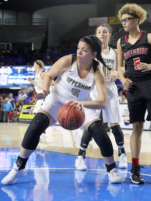 Upperman's Lexie Strickland (5) turns up court after pulling in a rebound against Alexis Trice (5) and South Side during the TSSAA Class AA state quarterfinals at the Murphy Center in Murfreesboro on Wednesday, March 8, 2017.