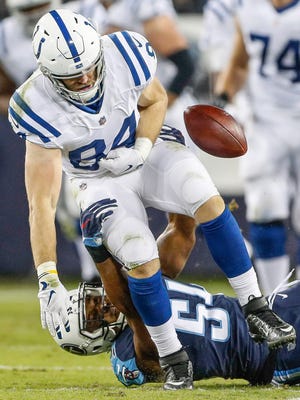 Indianapolis Colts tight end Jack Doyle (84) fumbles after being hit by Tennessee Titans inside linebacker Avery Williamson (54) at Nissan Field in Nashville, Tenn., on Monday, Oct. 16, 2017.
