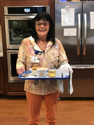 Sally Roberts volunteers as a meal server with Hospice Home of Hope.