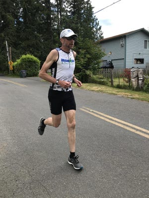 Marty Krafcik will try to complete his 11th Ironman competition this month.