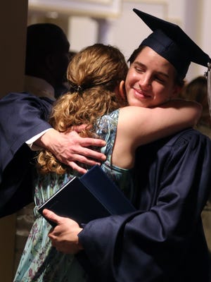 FRA graduates celebrate following their graduation Sunday May 29, 2016 at Brentwood United Methodist Church.