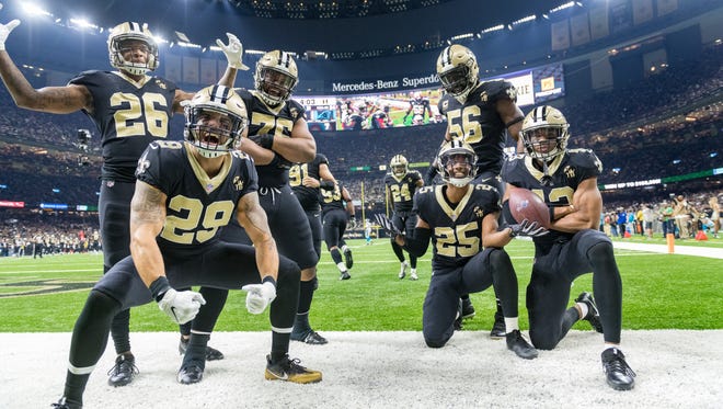 Saints defensive players celebrate in the endzone during the NFL football game between the New Orleans Saints and the Carolina Panthers in the Mecedes-Benz Superdome. Sunday, Dec. 30, 2018. (Pictured- Kurt Coleman #29 behind him PJ Williams #26 Taylor Stallworth #76 Trey Hendrickson #91 Cant see the two behind 91 Vonn Bell#24 Eli Apple #25 Marcus Williams #43)