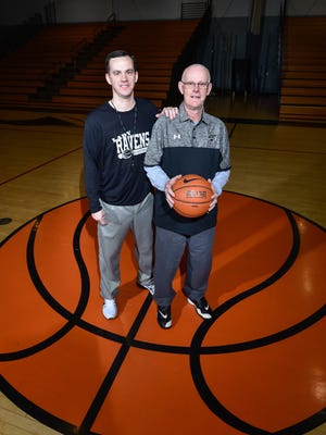 Sussex Tech girls basketball coach Chester Davis (right), who recently earned his 500th career coaching win, poses with his son Justin, a longtime assistant who will become the Ravens' head coach next season.