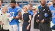 Lions owner Martha Firestone Ford stands with head