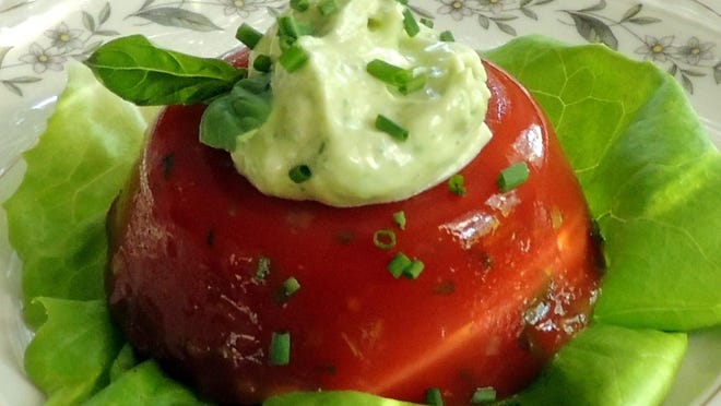 Herb Mayonnaise topping an Old-Fashioned Tomato Aspic. It's wonderful with shrimp, hard-cooked eggs, chicken, fish, and cold green vegetables such as asparagus, broccoli, or haricots verts, and grilled fish, lamb, poultry, or vegetables.