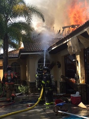 A fire at  6285  Scott Lane damaged a 5-bedroom, $700,000-plus home Monday.