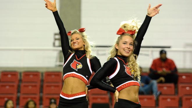 Mandy Lawonn and Sabrina Lindgren perform in the UofL Cheer and Dance 2016 Nationals Preview at Cardinal Arena Monday night. April 4, 2016. 