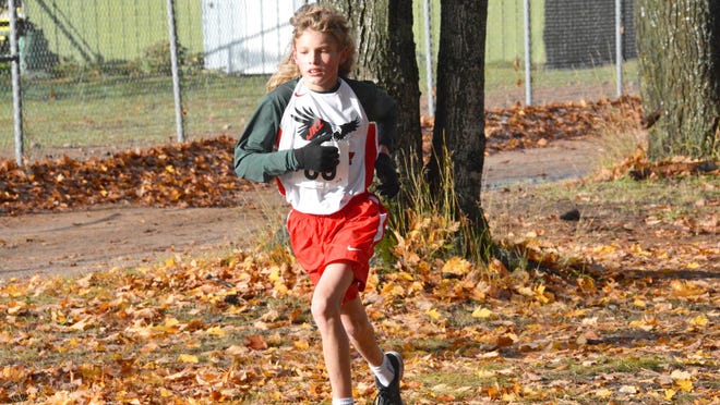 Gabe Litzner of JKL Bahweting leads a junior high race in Kinross this season. Litzner finished undefeated for the season in junior high/middle school races.