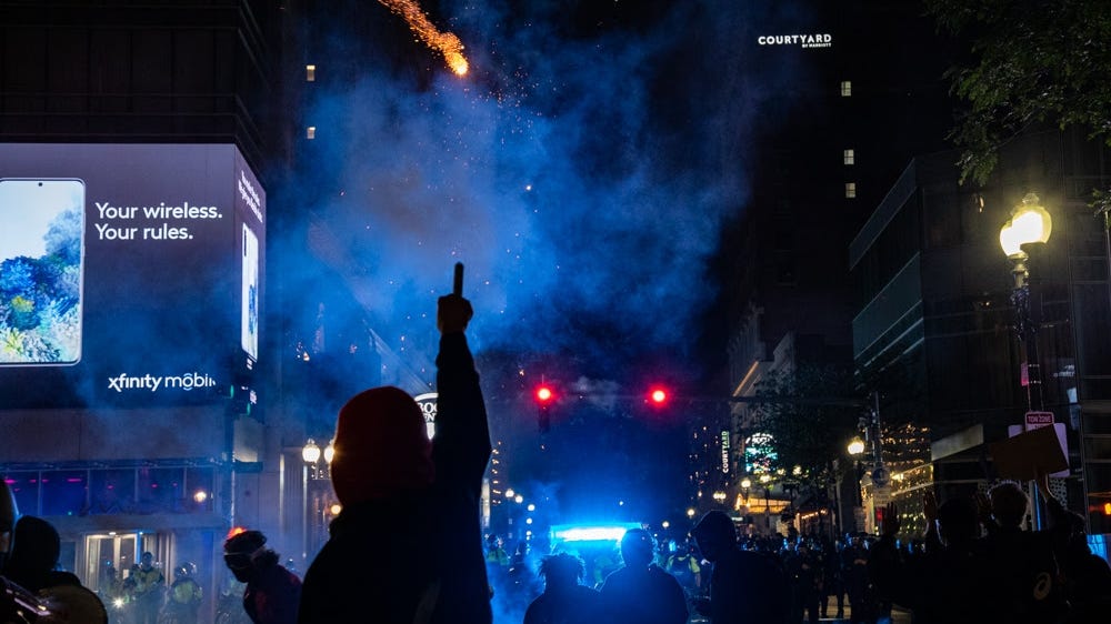 Clashes and violence follow peaceful Boston protest