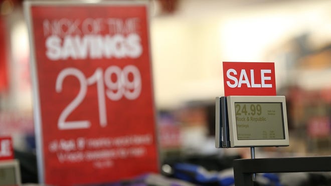 Signs mark sales at Kohl's department store.