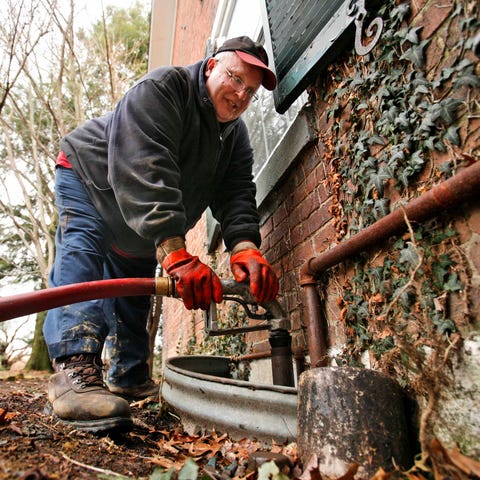 Filling a home heating oil tank at a Pennsylvania 
