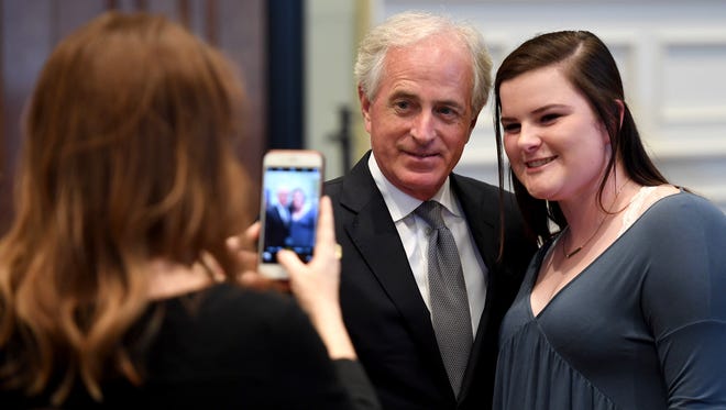 Senator Bob Corker takes a photo with Junior Rotarian Carson Connell during his visit to the Jackson Rotary Club meeting, Wednesday, April 4.