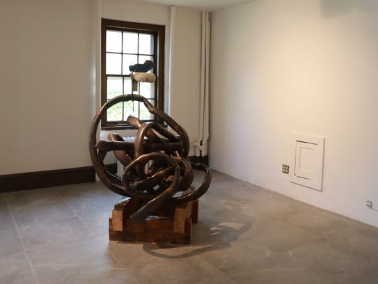Art is being installed for the upcoming art exhibit