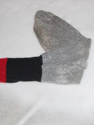Columnist Doug Berdan says a single sock in the wild is a scary picture.