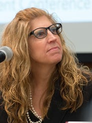 Dr. Karyl Rattay, along with local leaders, discuss the opioid crisis and a way forward during a conference at the Delaware Technical Community College in Dover last week.