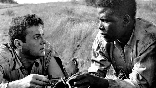 Tony Curtis and Sidney Poitier in "The Defiant Ones" (1958).