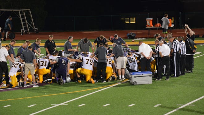 The score board reflected a 14-7 win for MVCA, but ultimately a win for football brotherhood as both teams took a knee, linked arms, and said a prayer together for the flooding victims.