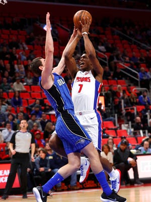 Stanley Johnson drives on Magic guard Mario Hezonja in the first half on Sunday at Little Caesars Arena.