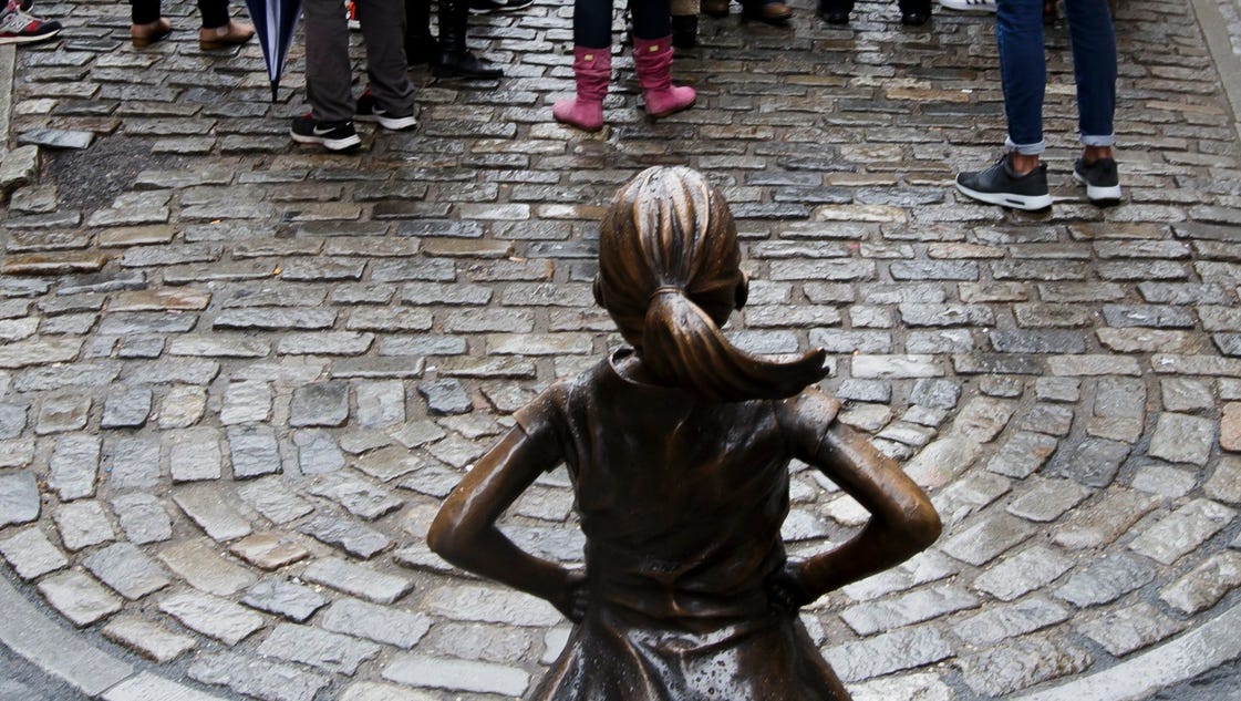 On International Women's Day, a statue of little girl defiantly stares