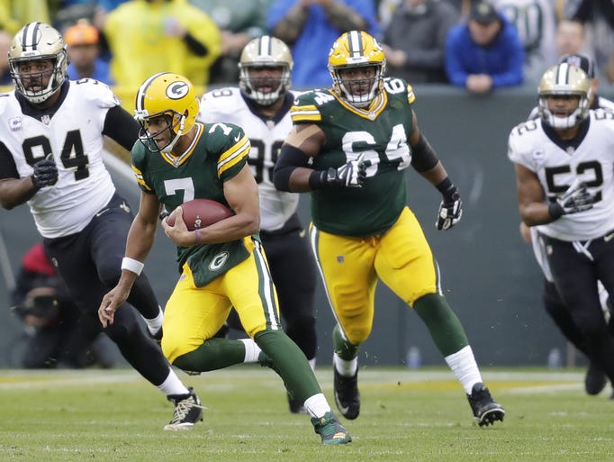 Green Bay Packers quarterback Brett Hundley (7) runs