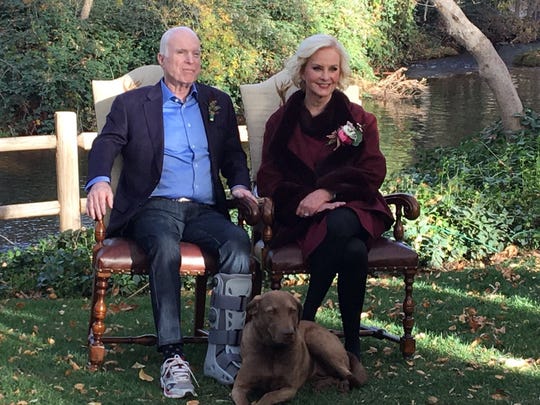 John and Cindy McCain pose with their dog, Gilley,