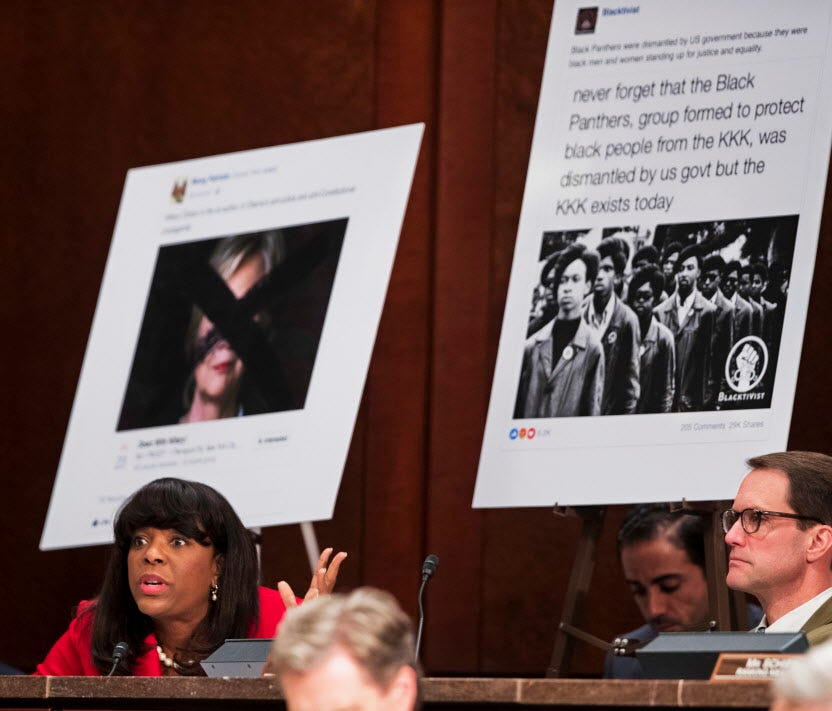 Rep. Terri Sewell, D-Ala., left, with Rep. Jim Himes, D-Conn., right, questions Facebook's General Counsel Colin Stretch on the role the company's lack of diversity played in the spread of racist messages by fake Russian accounts.