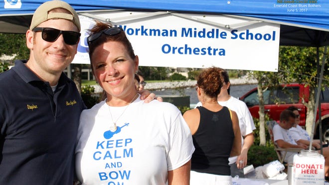 Stephen Olsen of Blues Angel Music and Christina Clark Frierdich of Workman Middle School team up to raise money for the school's orchestra.