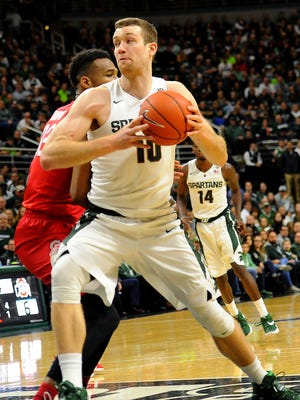 Spartan senior Matt Costello goes up for a shot in the first half of MSU's game with the Buckeyes. It's the final game of the regular season for the Spartans.