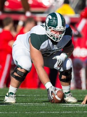 Senior center Jack Allen is a preseason candidate for both the Outland Trophy and the Rimington Trophy.
 USA TODAY Sports Oct 27, 2012; Madison, WI, USA;  Michigan State Spartans offensive lineman Jack Allen (66) during the game against the Wisconsin Badgers at Camp Randall Stadium.  Michigan State defeated Wisconsin 16-13.  Mandatory Credit: Jeff Hanisch-USA TODAY Sports
