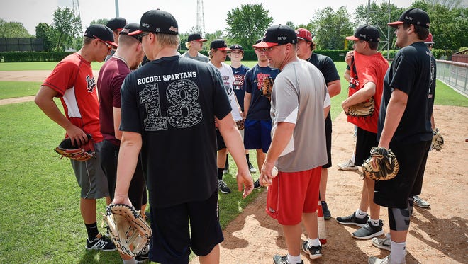 Rocori head coach Jeff Illies talks with the team before the start of practice Tuesday, June 12, 2018, in Cold Spring.