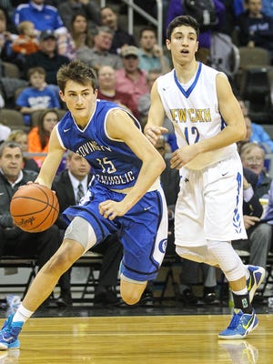 CovCath's Andy Flood drives past Zach Pangallo during the third quarter.