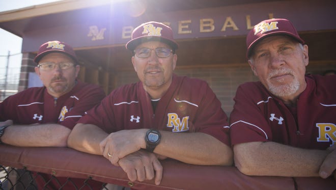 Rocky Mountain High School baseball coach Scott Bullock, center, along with assistants Roy Tripi and Glen Schwab have maintained state-wide success through the years with five titles.