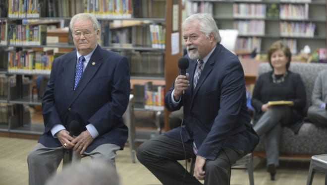 Incumbent Dick Hamm and challenger Dr. Brad Barrett participated in a candidate forum Tuesday at the Cambridge City library.