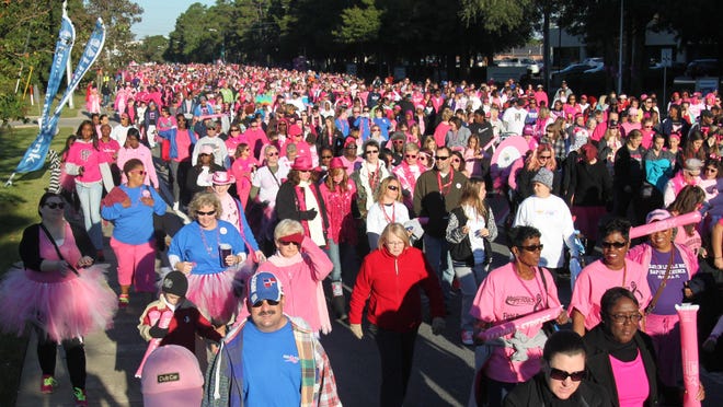 Thousands participate in a recent Making Strides Against Breast Cancer walk in this file photo. Volunteers from Making Strides Against Breast Cancer will have booths set up throughout Gallery Night.