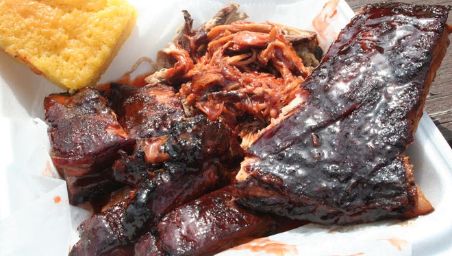 Ribs, rib tips, pulled pork and corn bread are among the top menu items at O.T. Up-N-Smoke.