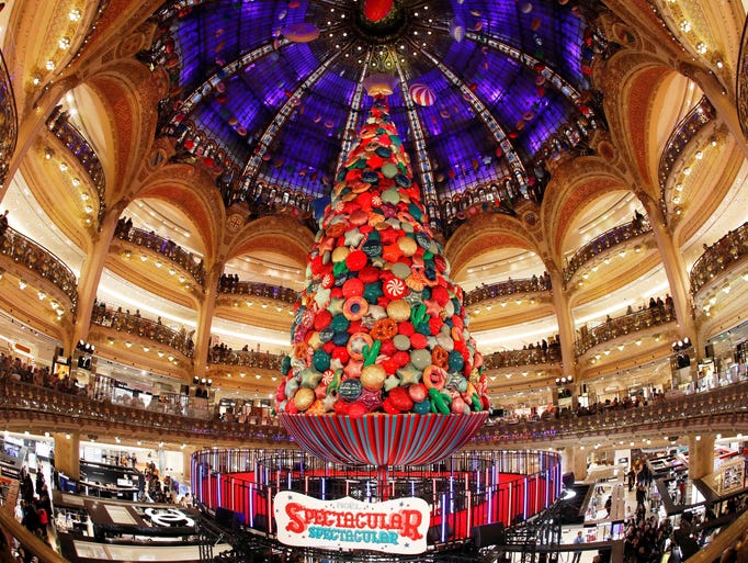 Holiday decorations light up cities around the world