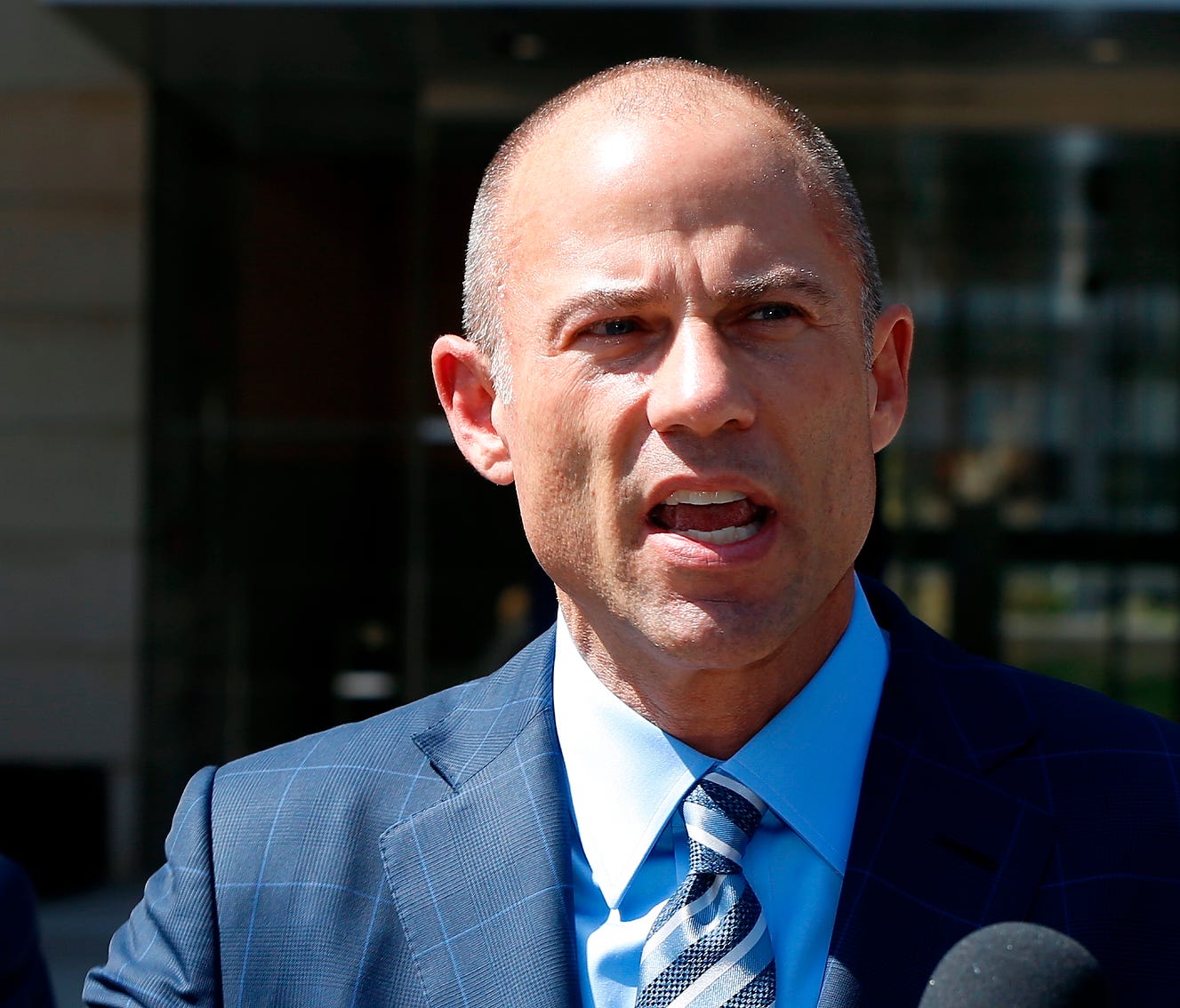 Michael Avenatti, attorney for porn actress Stormy Daniels, talks to the media outside court in Los Angeles April 20, 2018.