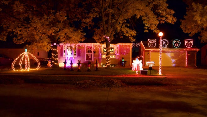This Halloween display of lights and music is set up on Daisy Drive in Manitowoc at the household of Lt. Jeremy Kronforst. He and his family run a Halloween and Christmas light show to help raise money for the Shop with a Cop program.