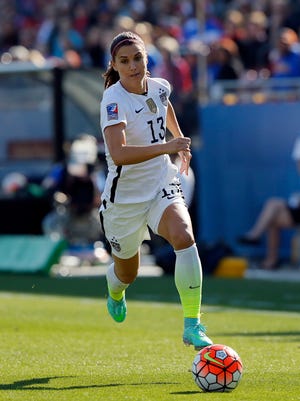Alex Morgan, shown during a CONCACAF Olympic qualifying tournament match, made her Orlando Pride debut on Thursday.