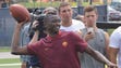 AS Roma forward Umar Sadiq throws a football as the