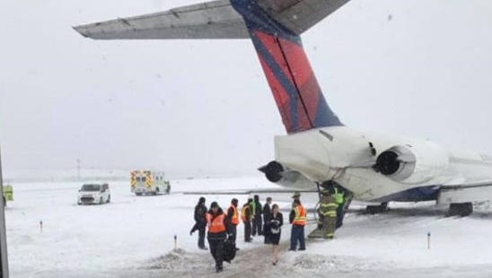 A Delta flight Sunday skidded off a runway at Detroit Metro Airport, but no one was injured.